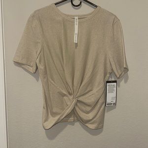 Lululemon shirt brand new still with tags size 8, super cute front